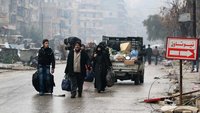 Menschen in Aleppo auf der Flucht.