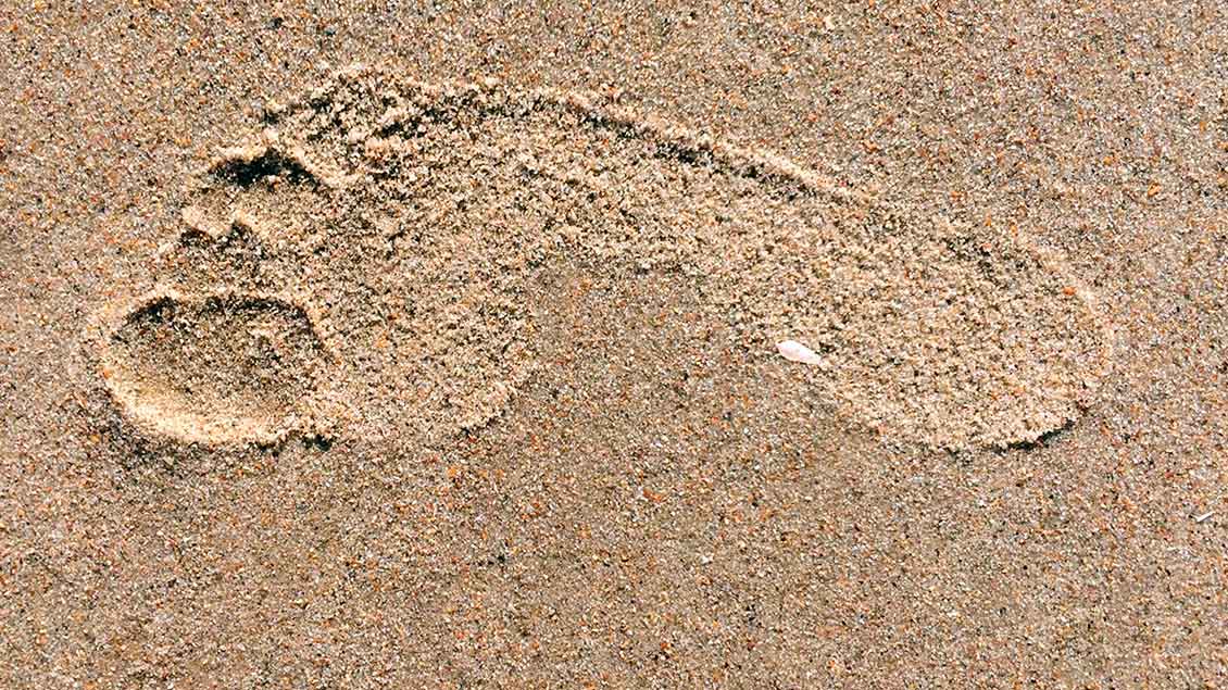 Fußabdruck im Sand.