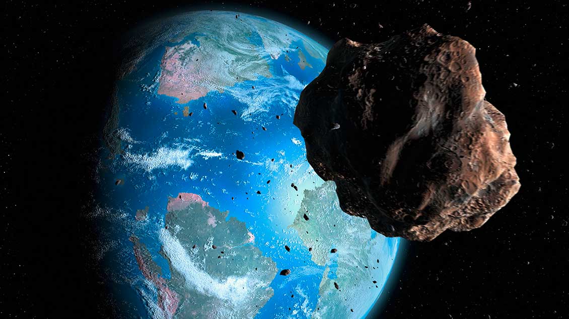 Ein Asteroid fliegt an der Erde vorbei Foto: Science Photo Library (Imago)